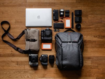 top view photo gadgets on hardwood floor